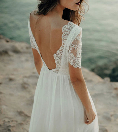 Young woman wearing the beach dress by Luna Bride.